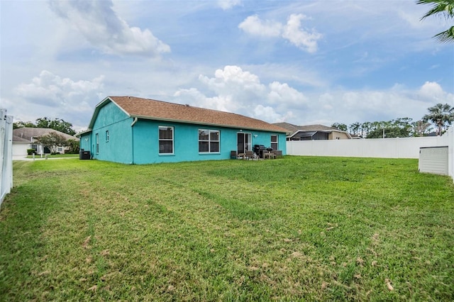 7046 Frascati Loop, Wesley Chapel, FL 33544 - back of house with stucco siding