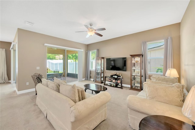 320 Roxbury Crossing Ct, Valrico, FL 33594 - living room featuring a ceiling fan and light colored carpet