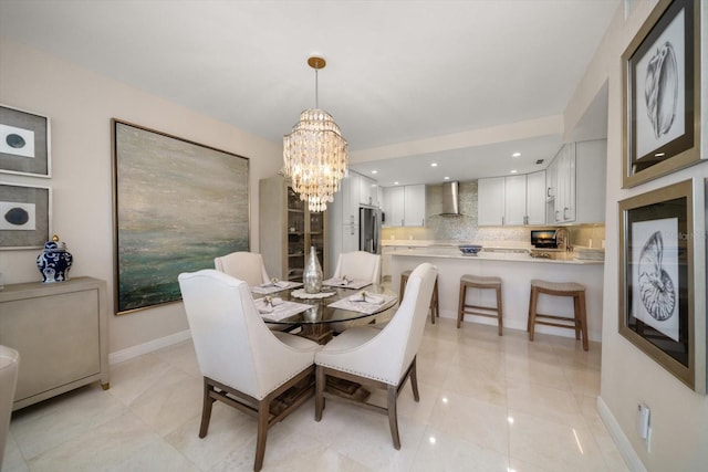4 Belleview Blvd Unit 305, Belleair, FL 33756 - dining area featuring a chandelier, light tile patterned flooring, and recessed lighting