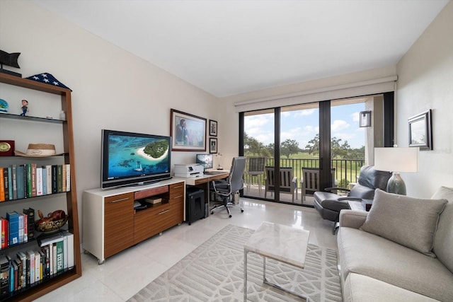 4 Belleview Blvd Unit 305, Belleair, FL 33756 - living room with a desk and light tile patterned floors
