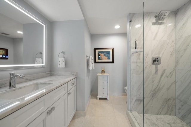 4 Belleview Blvd Unit 305, Belleair, FL 33756 - bathroom with a marble finish shower, vanity, recessed lighting, and tile patterned flooring