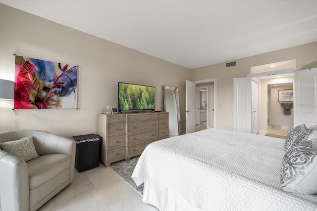 4 Belleview Blvd Unit 305, Belleair, FL 33756 - bedroom with light tile patterned floors