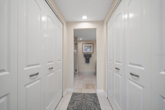 4 Belleview Blvd Unit 305, Belleair, FL 33756 - corridor featuring light tile patterned flooring and recessed lighting