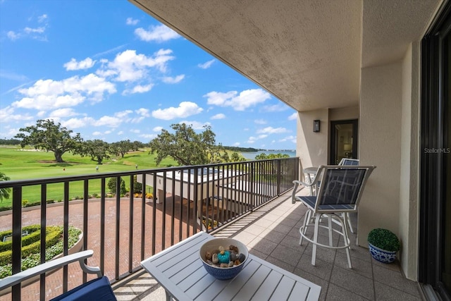 4 Belleview Blvd Unit 305, Belleair, FL 33756 - balcony featuring view of golf course and a water view