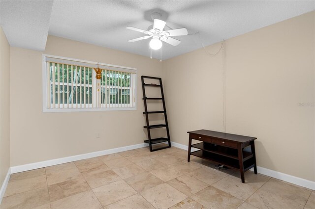 10033 64th Ave N Unit 4, Saint Petersburg, FL 33708 - empty room featuring ceiling fan and a textured ceiling