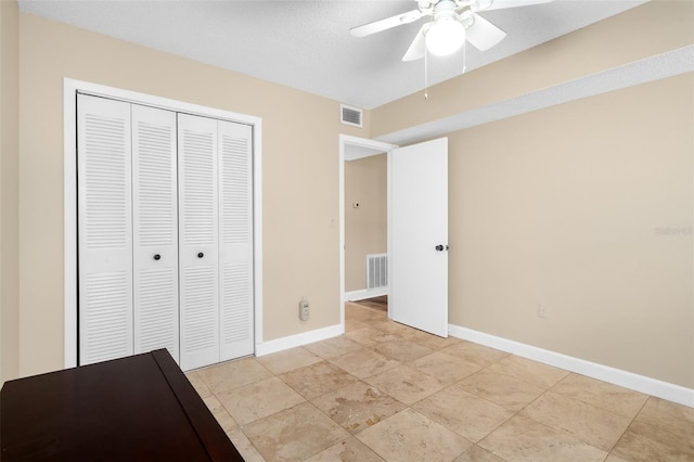 10033 64th Ave N Unit 4, Saint Petersburg, FL 33708 - unfurnished bedroom with a closet and a ceiling fan