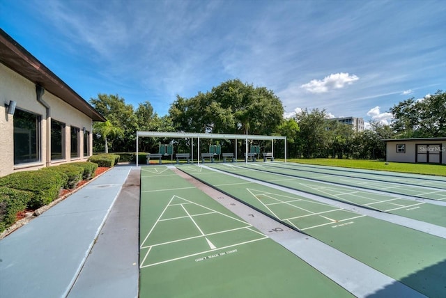 10033 64th Ave N Unit 4, Saint Petersburg, FL 33708 - view of community with shuffleboard