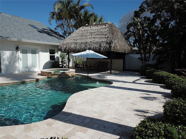 1837 Venetian Point Dr, Clearwater, FL 33755 - view of swimming pool featuring a patio and a pool with connected hot tub