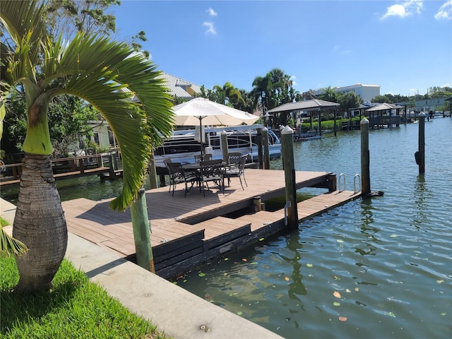 1837 Venetian Point Dr, Clearwater, FL 33755 - dock area featuring a water view and boat lift