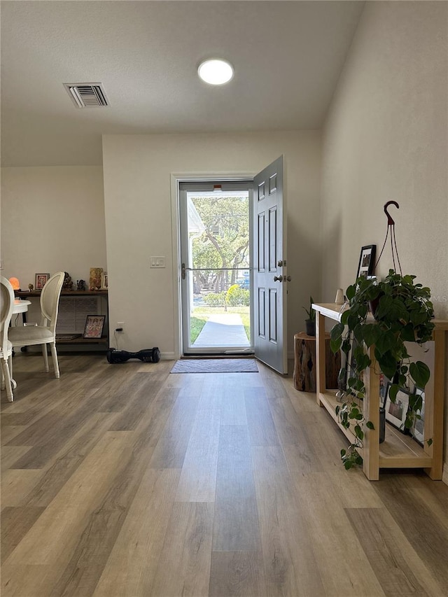 1737 N Lakewood Ave, Ocoee, FL 34761 - entrance foyer featuring wood finished floors