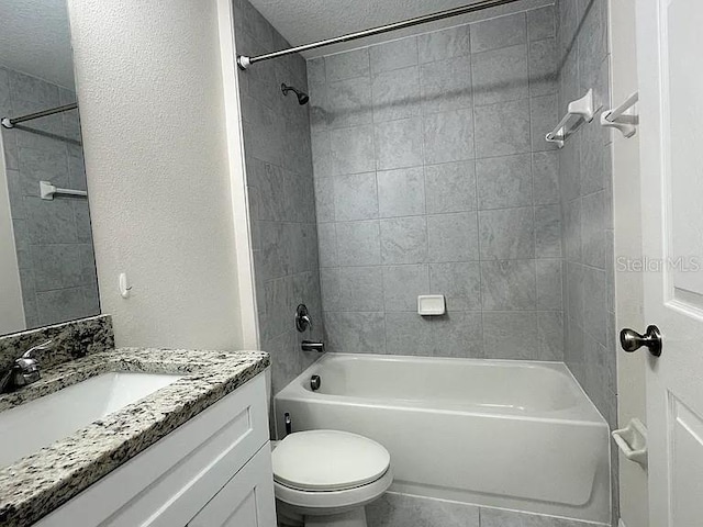 1737 N Lakewood Ave, Ocoee, FL 34761 - full bathroom with vanity, bathtub / shower combination, tile patterned floors, and a textured ceiling