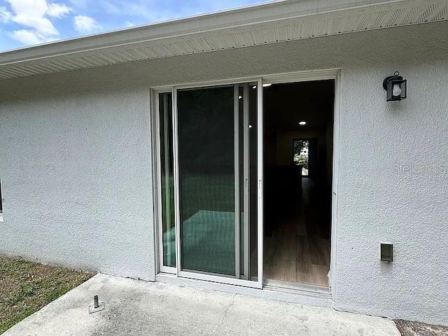 1737 N Lakewood Ave, Ocoee, FL 34761 - view of exterior entry with stucco siding