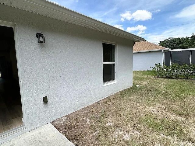 1737 N Lakewood Ave, Ocoee, FL 34761 - view of side of property featuring stucco siding