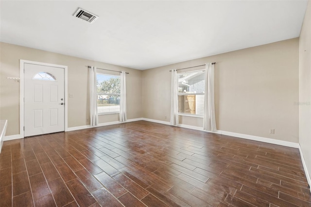 7112 2nd St N, Saint Petersburg, FL 33702 - entryway featuring dark wood-type flooring