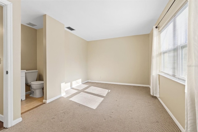 7112 2nd St N, Saint Petersburg, FL 33702 - unfurnished bedroom with carpet flooring and ensuite bath