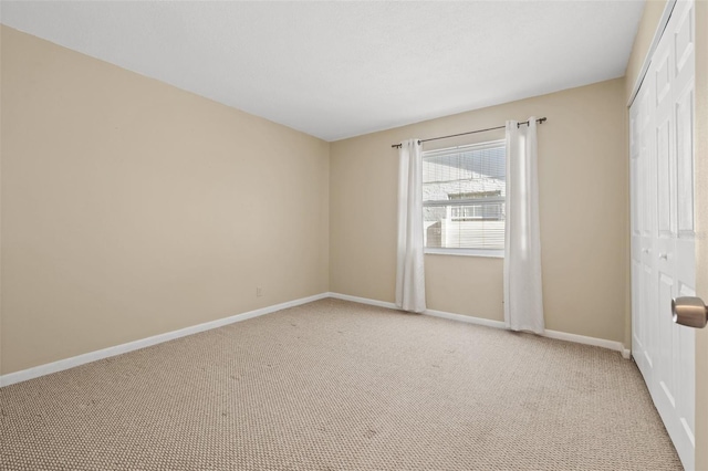 7112 2nd St N, Saint Petersburg, FL 33702 - spare room featuring light carpet