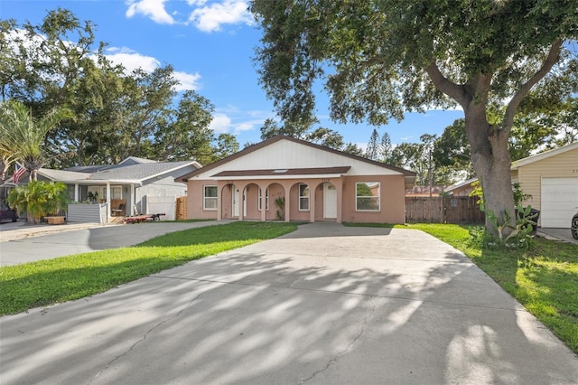 7112 2nd St N, Saint Petersburg, FL 33702 - ranch-style house featuring driveway and a porch