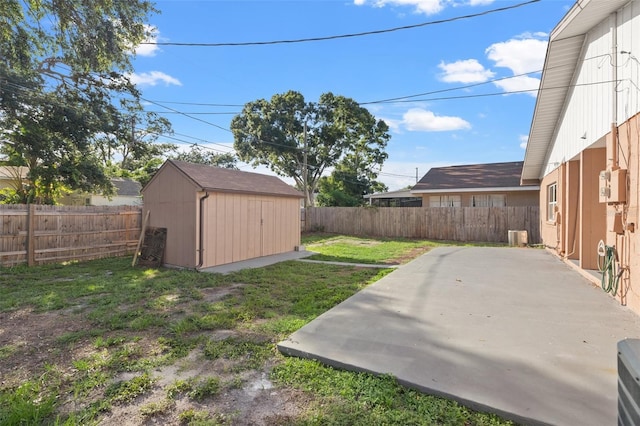 7112 2nd St N, Saint Petersburg, FL 33702 - fenced backyard with a shed and a patio