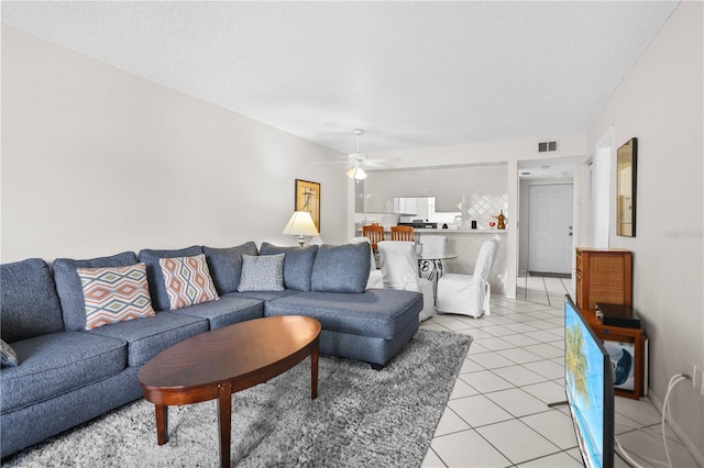 2625 State Road 590 Unit 723, Clearwater, FL 33759 - living room featuring light tile patterned floors and a ceiling fan