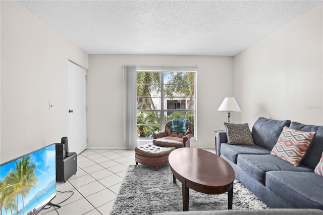 2625 State Road 590 Unit 723, Clearwater, FL 33759 - living room with light tile patterned floors and a textured ceiling
