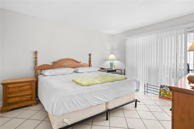 2625 State Road 590 Unit 723, Clearwater, FL 33759 - bedroom featuring light tile patterned floors