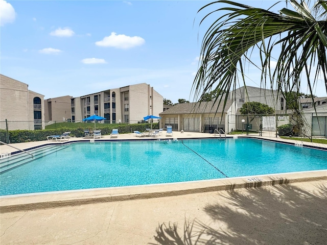 2625 State Road 590 Unit 723, Clearwater, FL 33759 - community pool featuring a patio