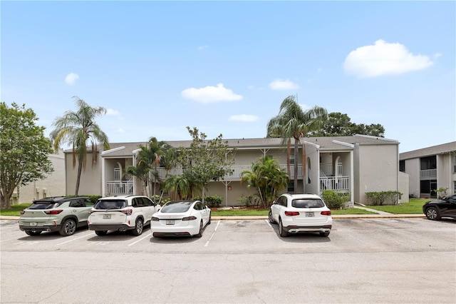 2625 State Road 590 Unit 723, Clearwater, FL 33759 - townhome / multi-family property featuring uncovered parking and stucco siding