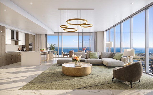 235 1st Ave S Unit 2405, Saint Petersburg, FL 33701 - living room featuring expansive windows, light marble finish floors, a chandelier, and recessed lighting