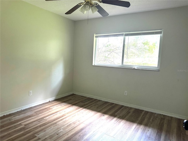 3645 E Country Side Dr, Inverness, FL 34452 - empty room featuring wood finished floors and a ceiling fan