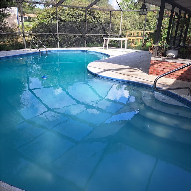 3645 E Country Side Dr, Inverness, FL 34452 - outdoor pool featuring a patio area and a lanai