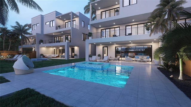 324 Capri Blvd, Treasure Island, FL 33706 - view of pool with an outdoor living space, a patio, and a pool with connected hot tub