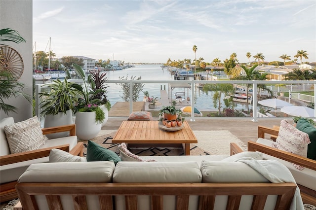 324 Capri Blvd, Treasure Island, FL 33706 - balcony with an outdoor living space and a water view