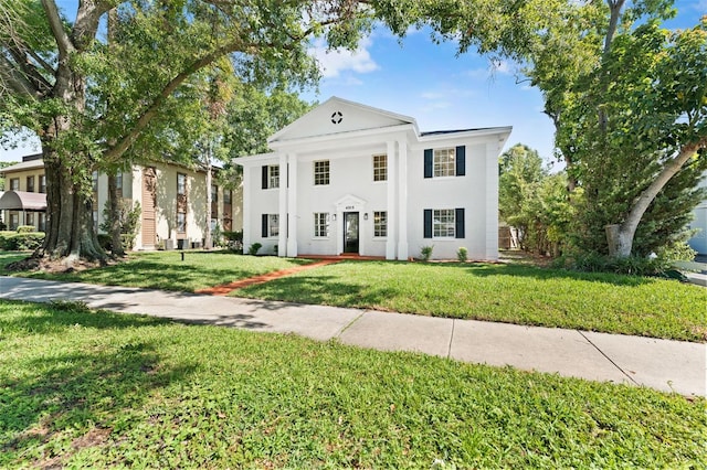4313 W N A St, Tampa, FL 33609 - greek revival house with a front yard and stucco siding