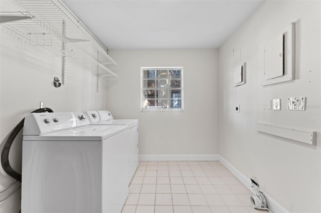 4313 W N A St, Tampa, FL 33609 - washroom with separate washer and dryer and light tile patterned floors