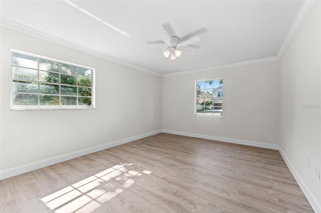 4313 W N A St, Tampa, FL 33609 - empty room featuring crown molding, light wood-style floors, and ceiling fan
