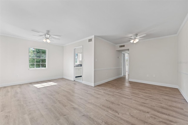 4313 W N A St, Tampa, FL 33609 - spare room featuring a ceiling fan, ornamental molding, and light wood finished floors