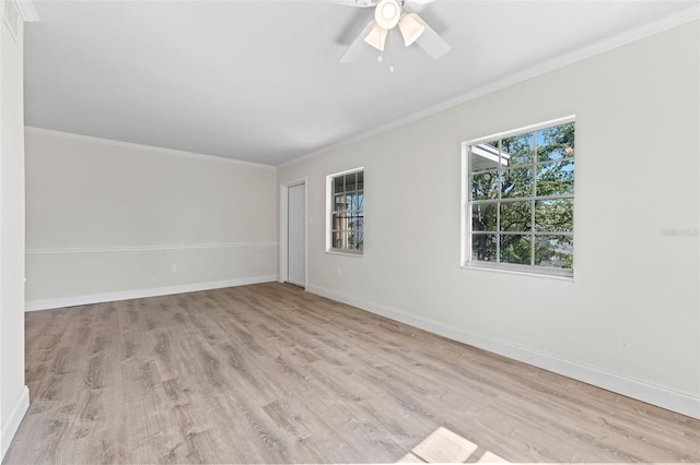 4313 W N A St, Tampa, FL 33609 - spare room with wood finished floors, ornamental molding, and a ceiling fan