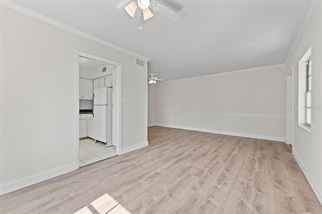 4313 W N A St, Tampa, FL 33609 - unfurnished living room featuring a ceiling fan, light wood-style flooring, and ornamental molding