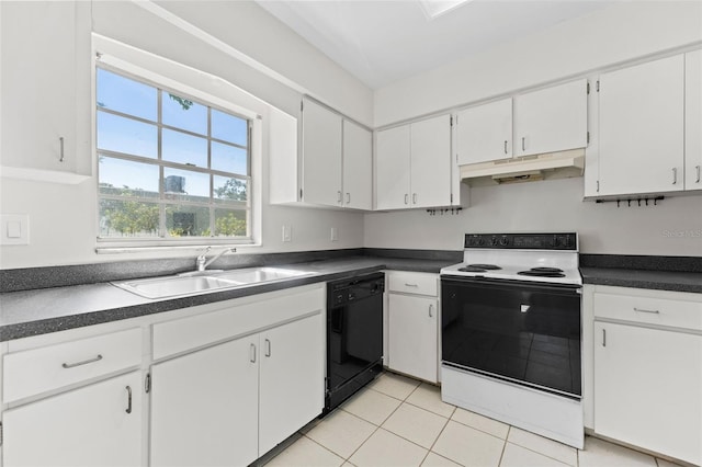 4313 W N A St, Tampa, FL 33609 - kitchen with white electric range oven, black dishwasher, under cabinet range hood, dark countertops, and white cabinets