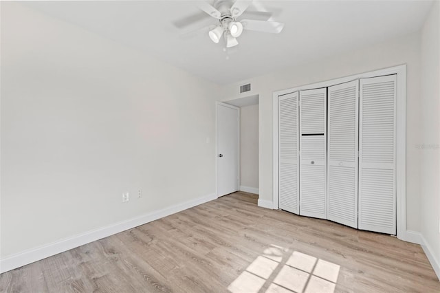 4313 W N A St, Tampa, FL 33609 - unfurnished bedroom with light wood-style floors, a closet, and ceiling fan