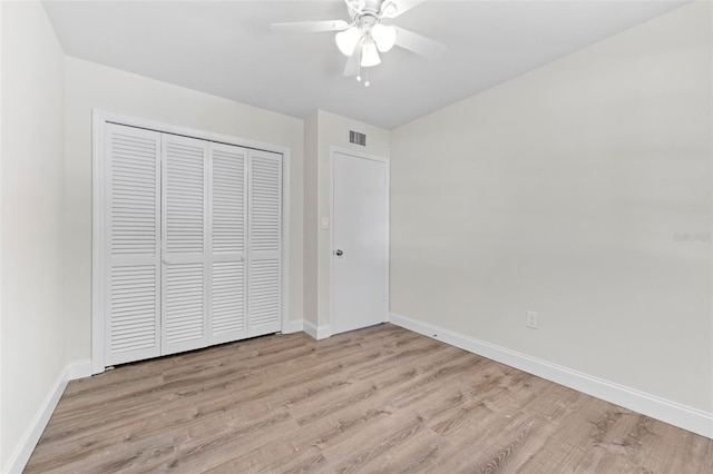 4313 W N A St, Tampa, FL 33609 - unfurnished bedroom with wood finished floors, a closet, and ceiling fan