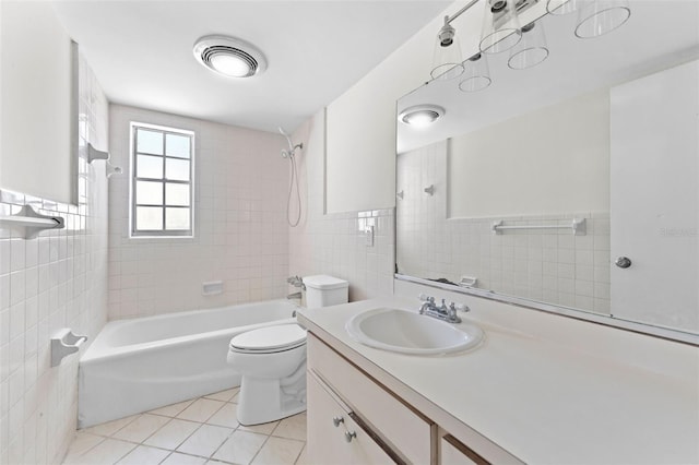 4313 W N A St, Tampa, FL 33609 - bathroom with tile walls, tile patterned flooring, shower / bath combination, vanity, and wainscoting