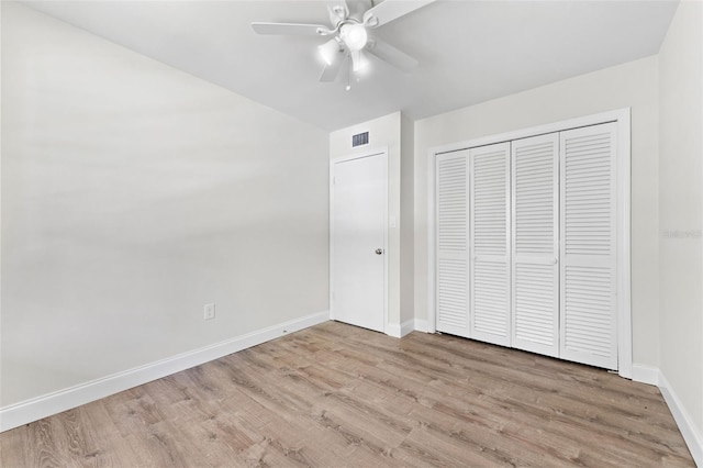 4313 W N A St, Tampa, FL 33609 - unfurnished bedroom with wood finished floors, a closet, and ceiling fan