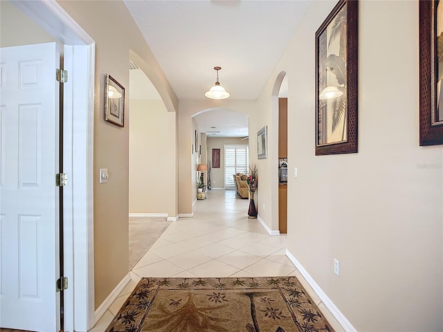 3409 61st Ter E, Ellenton, FL 34222 - hall featuring arched walkways and light tile patterned floors