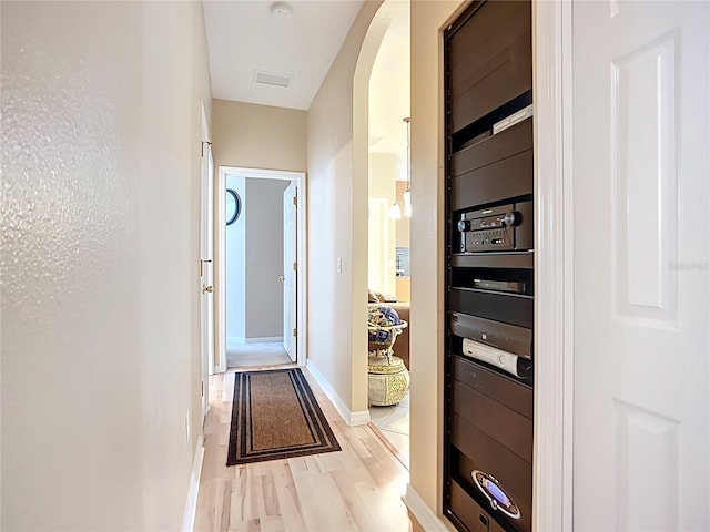 3409 61st Ter E, Ellenton, FL 34222 - hall featuring arched walkways and light wood-style floors