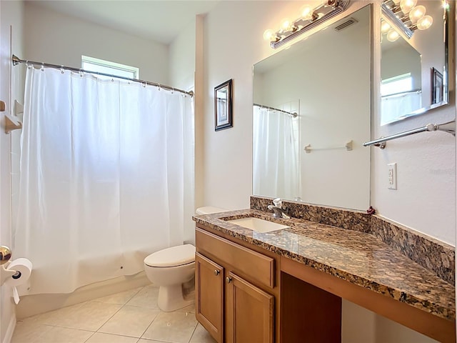 3409 61st Ter E, Ellenton, FL 34222 - full bathroom featuring tile patterned floors, vanity, and shower / bath combo with shower curtain