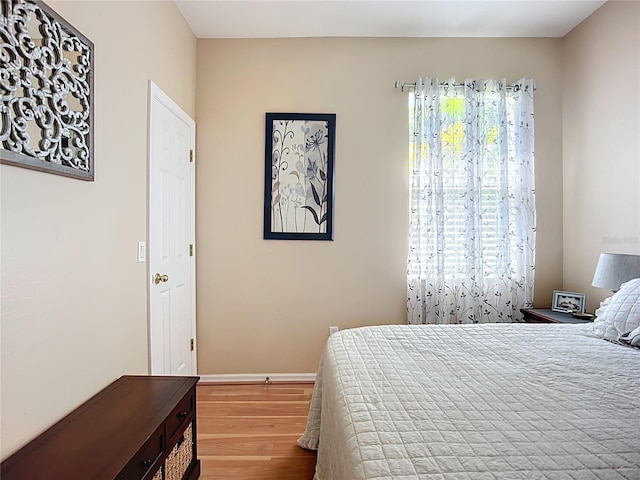 3409 61st Ter E, Ellenton, FL 34222 - bedroom featuring wood finished floors and baseboards