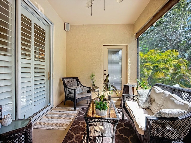 3409 61st Ter E, Ellenton, FL 34222 - sunroom with a textured wall, outdoor lounge area, and a ceiling fan