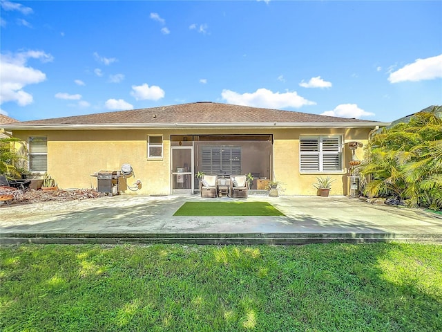 3409 61st Ter E, Ellenton, FL 34222 - back of property with a patio area, stucco siding, and a lawn