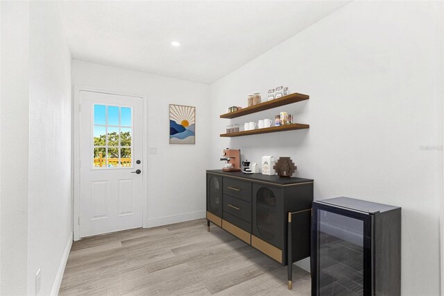 380 Colony Point Rd S, Saint Petersburg, FL 33705 - entryway with beverage cooler, light wood-style floors, and recessed lighting